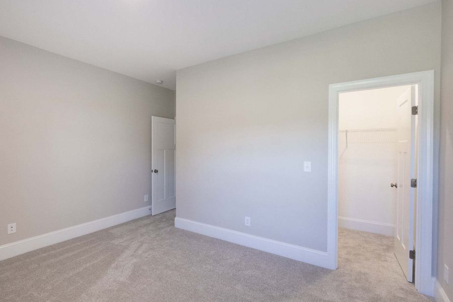 Representative unfurnished interior of a home built from the Carver by Caviness & Cates Communities in Maggie Way, Wendell (Image 143).