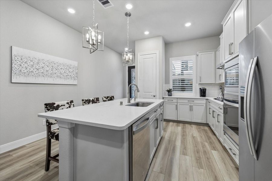 Furnished interior view inside a new home in Spring Brook Village - Luxe Series, Houston (Image 13).