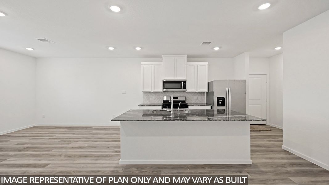 Furnished interior view inside a new home in Bridges on Lake Houston Villas, Humble (Image 5).