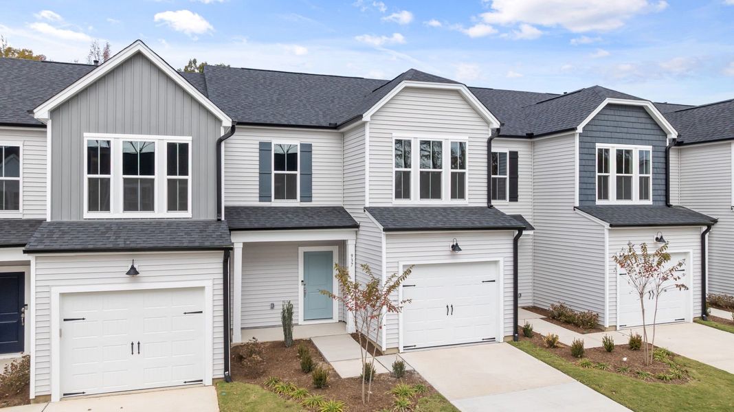 Front exterior of a new home in Poets Walk, Whitsett, NC, highlighting curb appeal (Image 2).