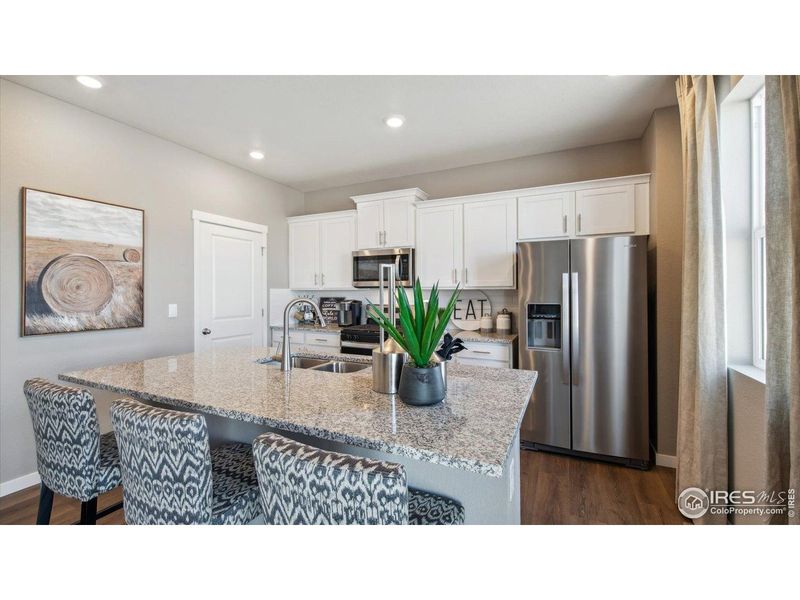 Furnished interior view inside a new home in Vista Meadows, Fort Lupton (Image 18).