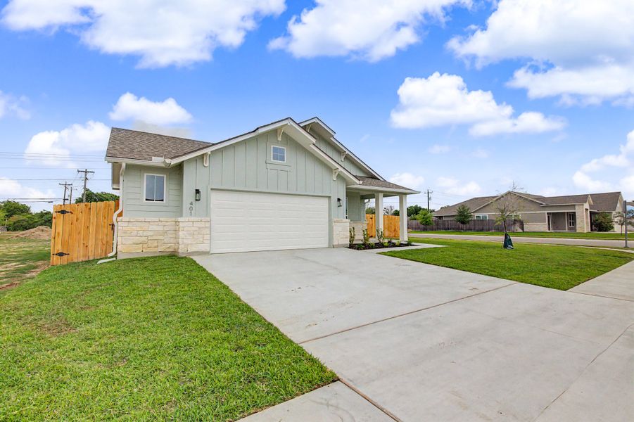 Front exterior of a new home in TerraVista, Victoria, TX, highlighting curb appeal (Image 29). Front exterior of a new home in TerraVista, Victoria, TX, highlighting curb appeal (Image 29).