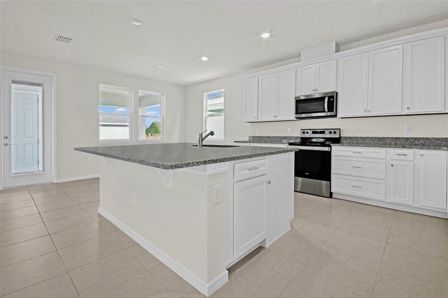 Furnished interior view inside a new home in Weslyn Park, St. Cloud (Image 10).