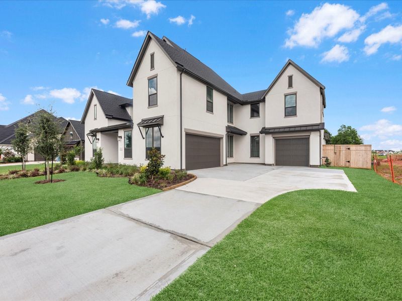 Front exterior of a new home in Sienna 80′, Missouri City, TX, highlighting curb appeal (Image 20).