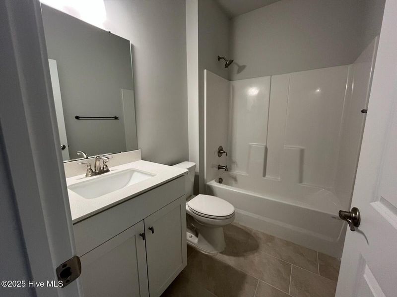 Furnished interior view inside a new home in Palmetto Creek, Bolivia (Image 9).