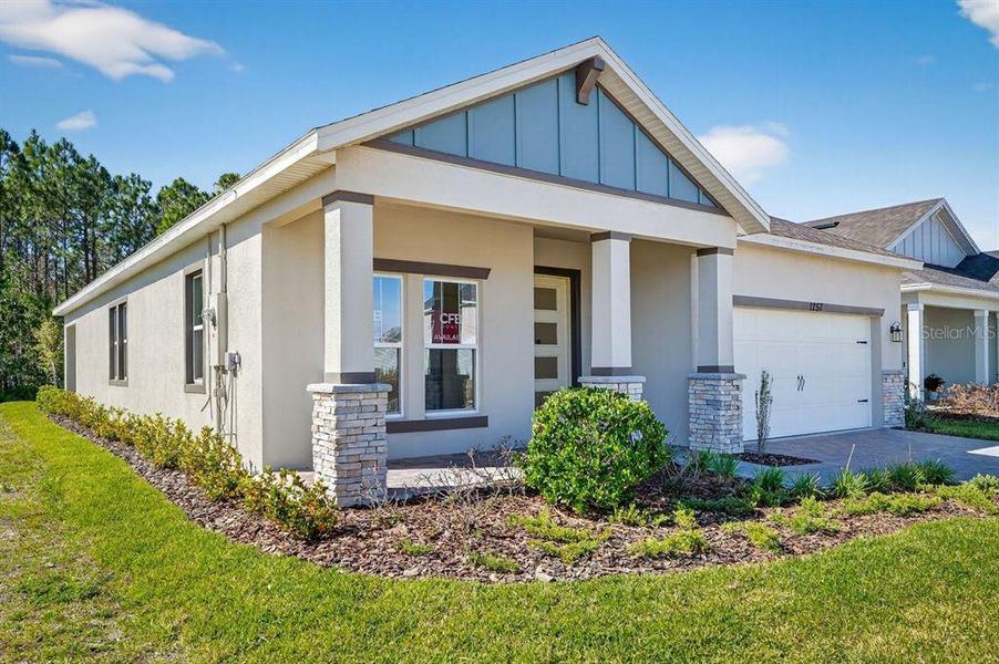 Exterior details and patio area of a home in Gray Hawk at Hole Two, Daytona Beach (Image 34).