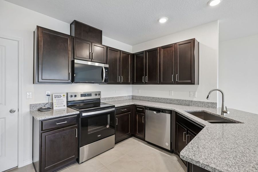 Furnished interior view inside a new home in Reserve at Forest Lake Townhomes, Lake Wales (Image 6).