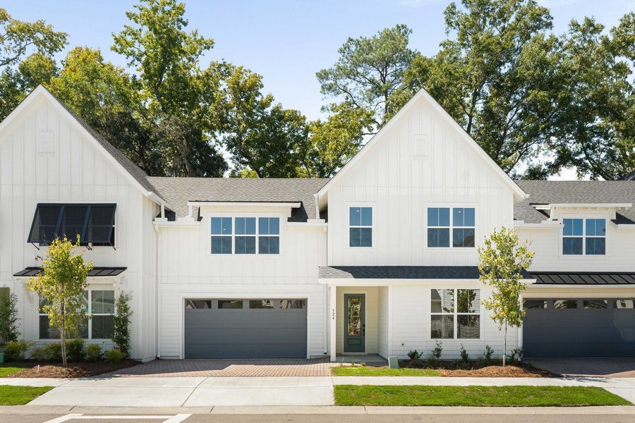 Front exterior of a new home in , Johns Island, SC, highlighting curb appeal (Image 1). Front exterior of a new home in , Johns Island, SC, highlighting curb appeal (Image 1).