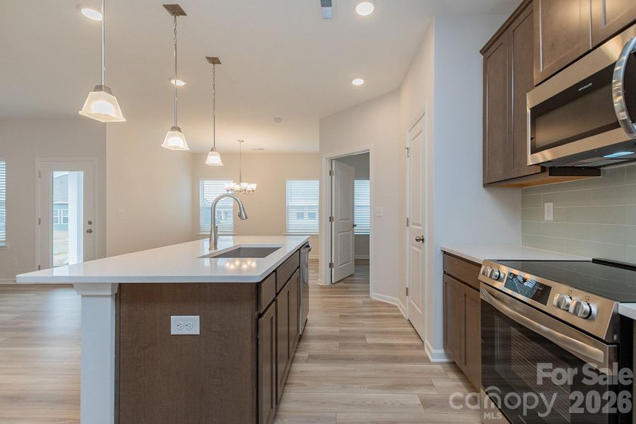 Furnished interior view inside a new home in Pine Bluff, Midland (Image 5). Furnished interior view inside a new home in Pine Bluff, Midland (Image 5).