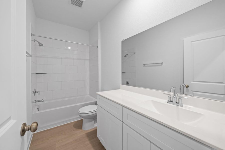 Furnished interior view inside a new home in Crosby Farms, Crosby (Image 6).