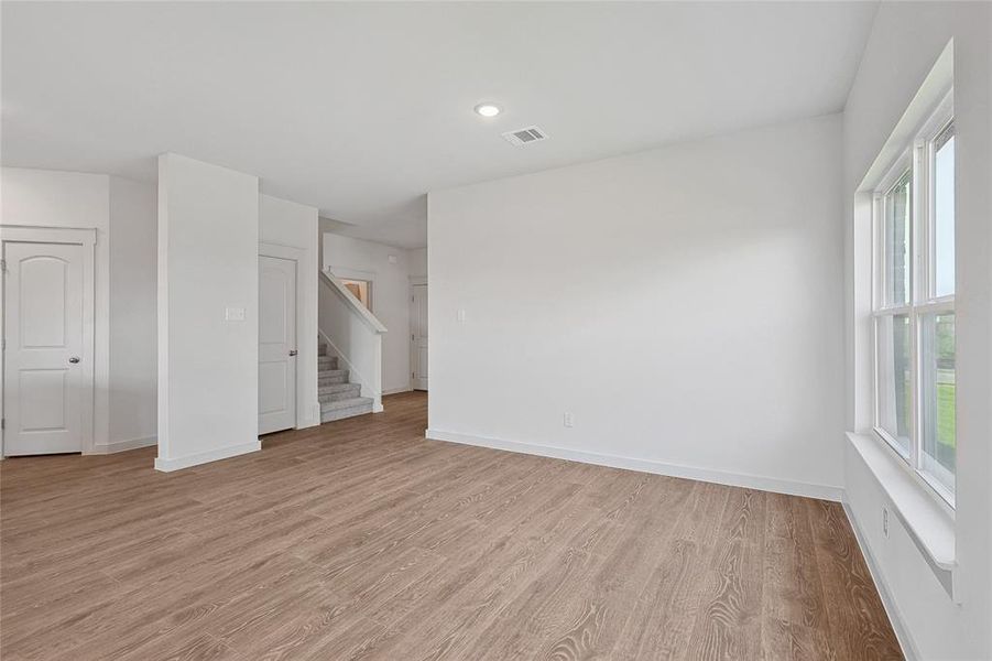 Unfurnished room featuring light hardwood / wood-style flooring