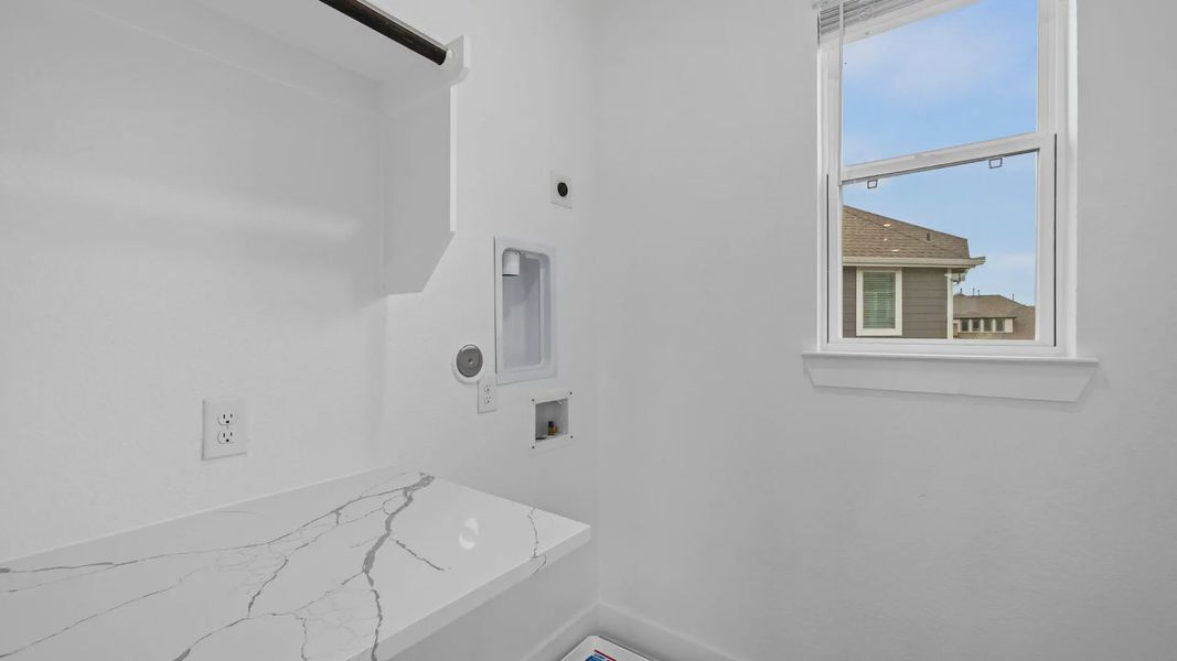 Furnished interior view inside a new home in Elyson Courtyard Collection, Katy (Image 11).