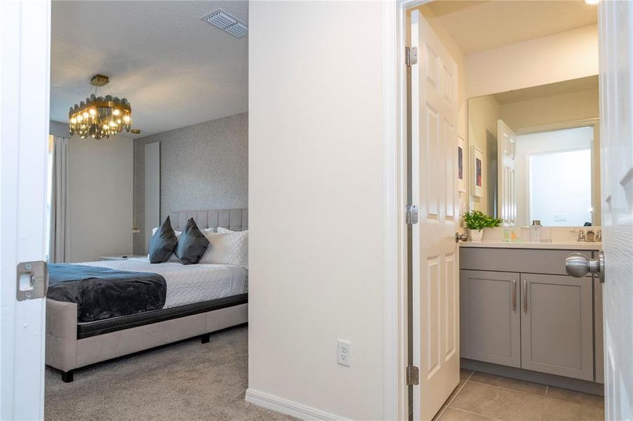 Furnished interior view inside a new home in Solara Resort, Kissimmee (Image 24).