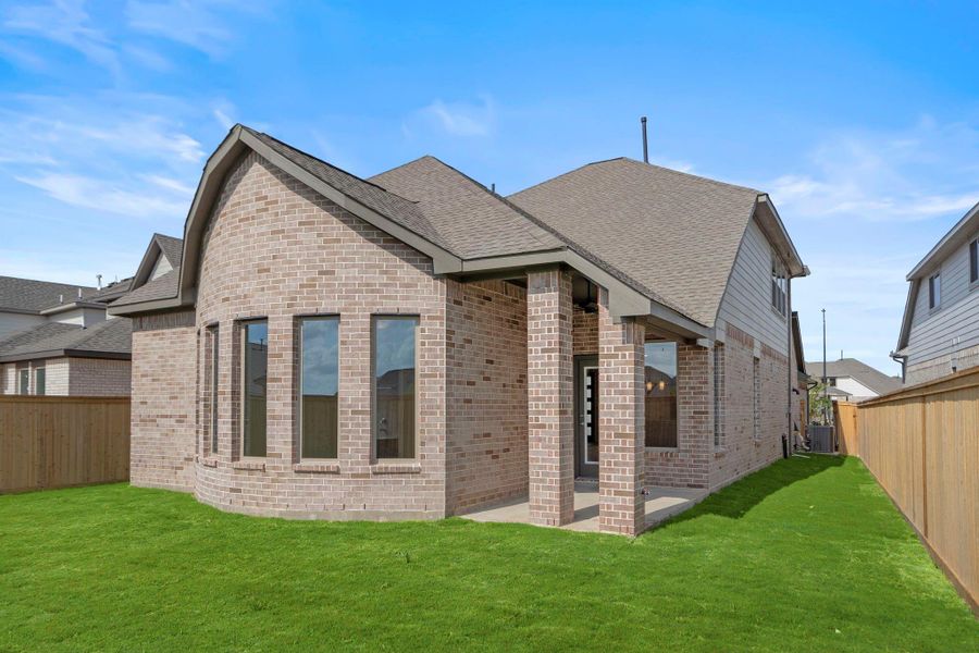 Exterior details and patio area of a home in Bridgeland 40', Cypress (Image 3).