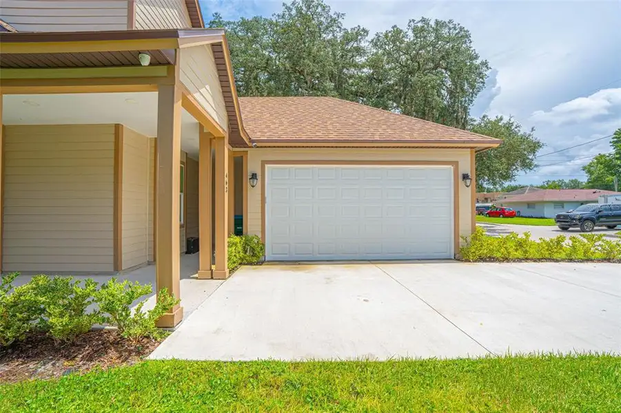 Front exterior of a new home in , Longwood, FL, highlighting curb appeal (Image 1). Front exterior of a new home in , Longwood, FL, highlighting curb appeal (Image 1).