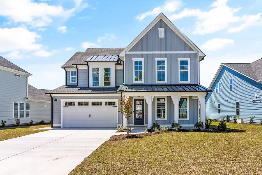 Representative exterior photo of a completed home built from the The Hampton by RobuckHomes in Windwater, Hampstead, NC (Image 2).