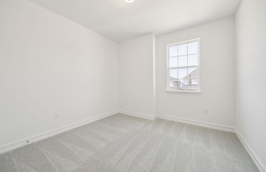 Roomy secondary bedroom with extensive closet storage *Real home pictured Roomy secondary bedroom with extensive closet storage *Real home pictured