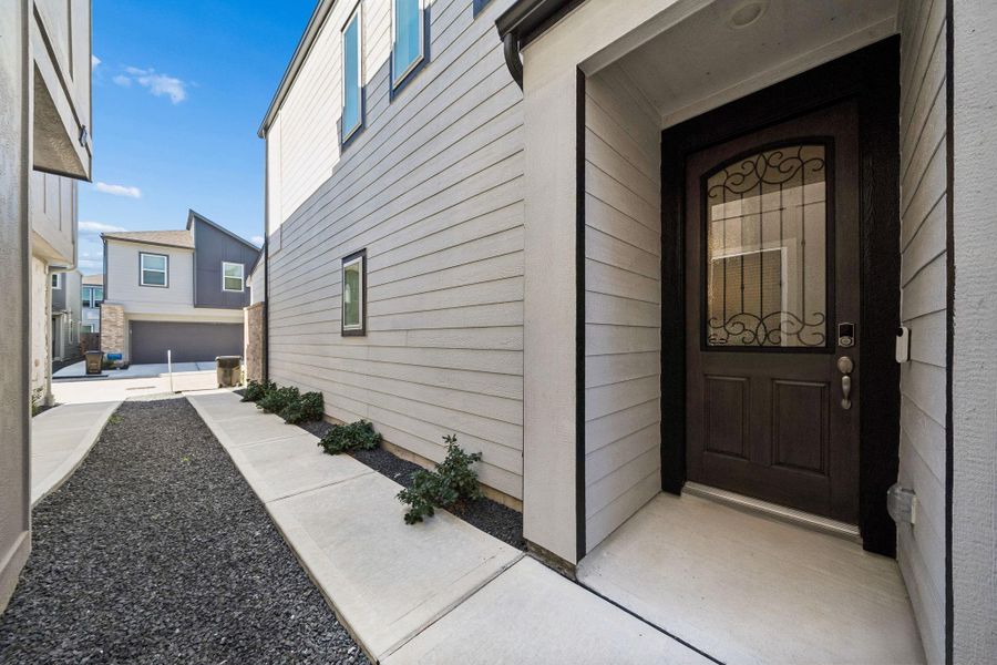 Exterior details and patio area of a home in Spring Brook Village - City Series, Houston (Image 4).