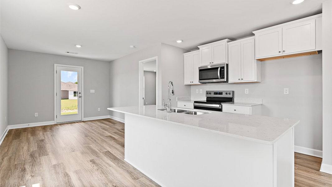Furnished interior view inside a new home in Colonial East, Panama City Beach (Image 6).