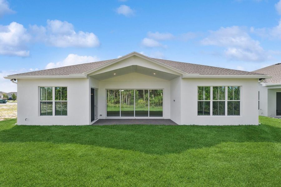 Front exterior of a new home in , Port St. Lucie, FL, highlighting curb appeal (Image 21). Front exterior of a new home in , Port St. Lucie, FL, highlighting curb appeal (Image 21).