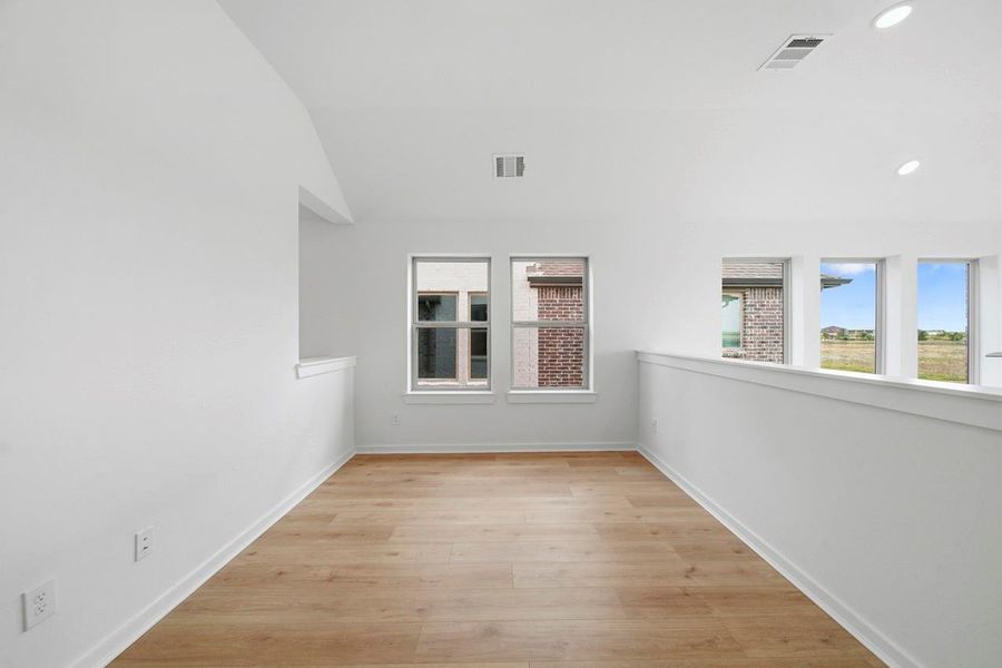 Spacious, unfurnished interior of a new home in Bridgeland, Cypress (Image 18).