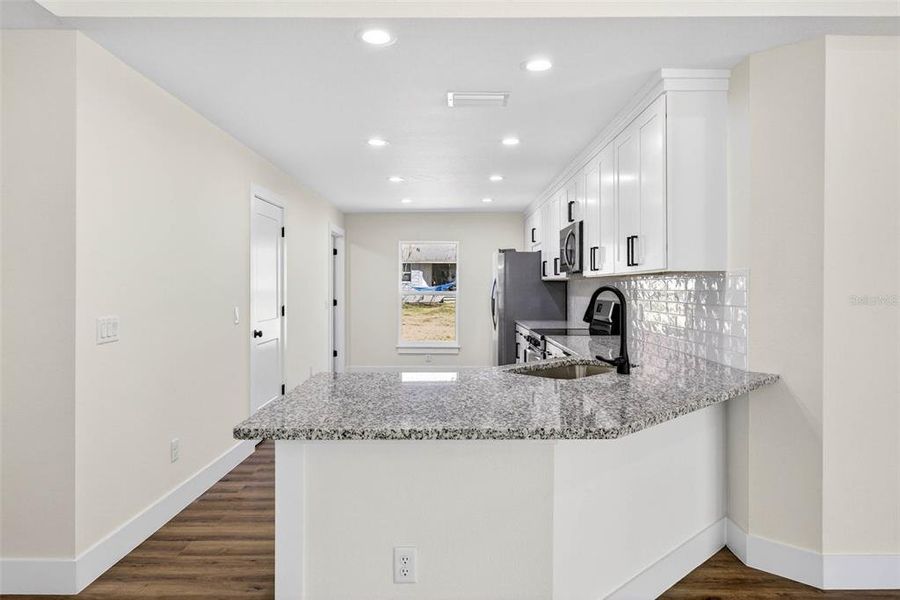 Furnished interior view inside a new home in , Dade City (Image 7).