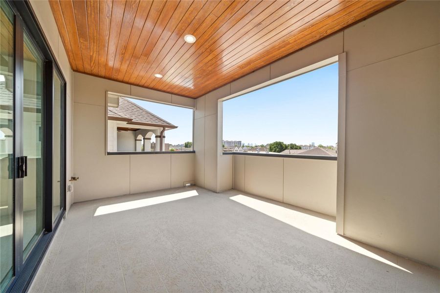 Exterior details and patio area of a home in , Houston (Image 3).