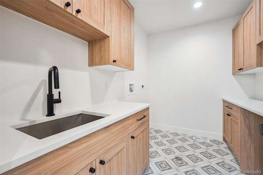 Huge walk in primary suite closet with custom shelving