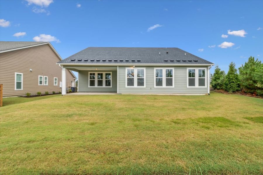 Exterior details and patio area of a home in Sinclair at Crawford Creek, Grovetown (Image 25).