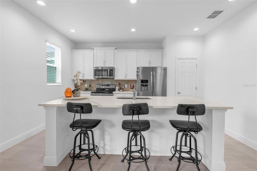 Furnished interior view inside a new home in Ridgeview, Clermont (Image 8).