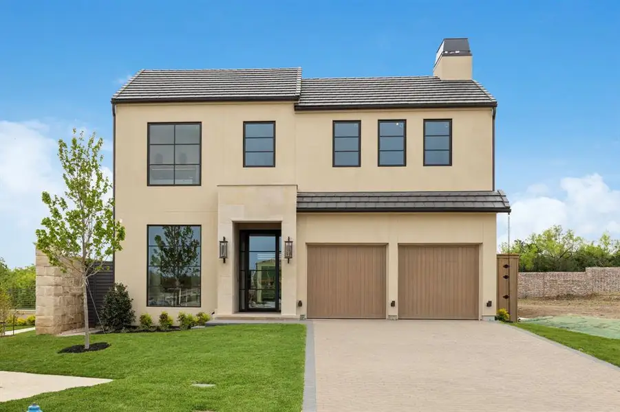 Front exterior of a home in the Avadene at Las Colinas community, located in Irving, TX (Image 4).