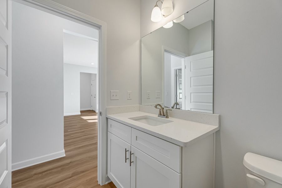 Furnished interior view inside a new home in Live Oak Cottages, Freeport (Image 12).