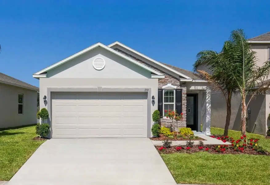 Front exterior of a new home in Heritage Station, Punta Gorda, FL, highlighting curb appeal (Image 1). Front exterior of a new home in Heritage Station, Punta Gorda, FL, highlighting curb appeal (Image 1).