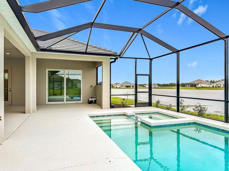 Exterior details and patio area of a home in River Preserve Estates, Parrish (Image 23).
