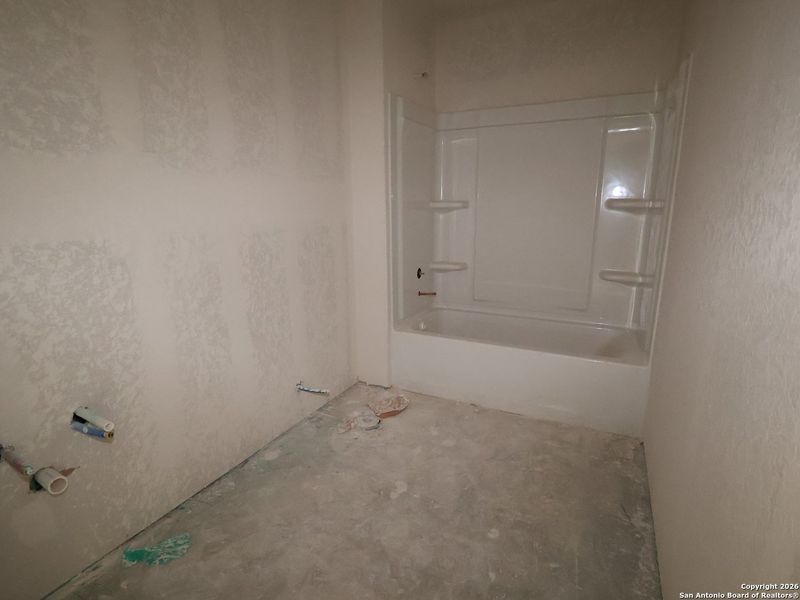 In-progress construction of a new home in Greenspoint Heights, Seguin, TX (Image 25).