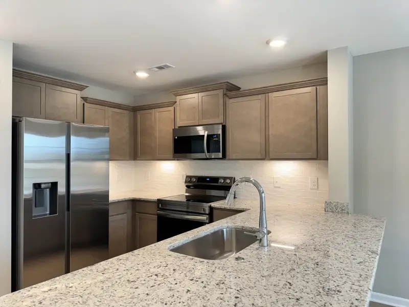 Furnished interior view inside a new home in Wheatfield, Shelbyville (Image 3).