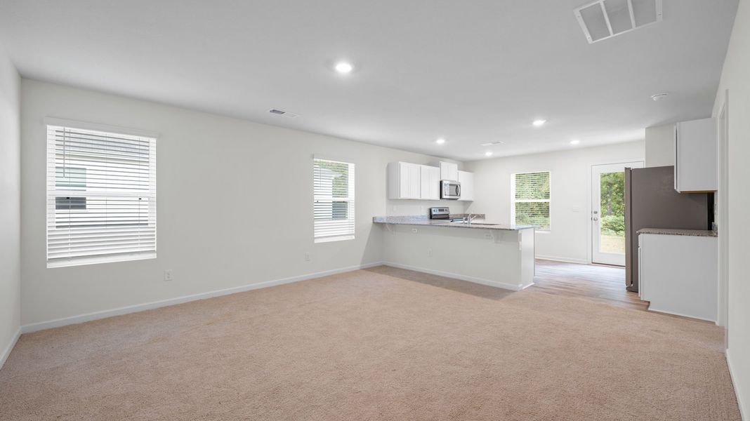 Representative unfurnished interior of a home built from the Lewis by D.R. Horton in Crescent Ridge, Niota (Image 9).
