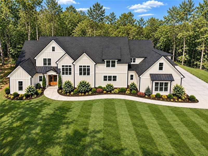 Front exterior of a new home in , Winston, GA, highlighting curb appeal (Image 1). Front exterior of a new home in , Winston, GA, highlighting curb appeal (Image 1).