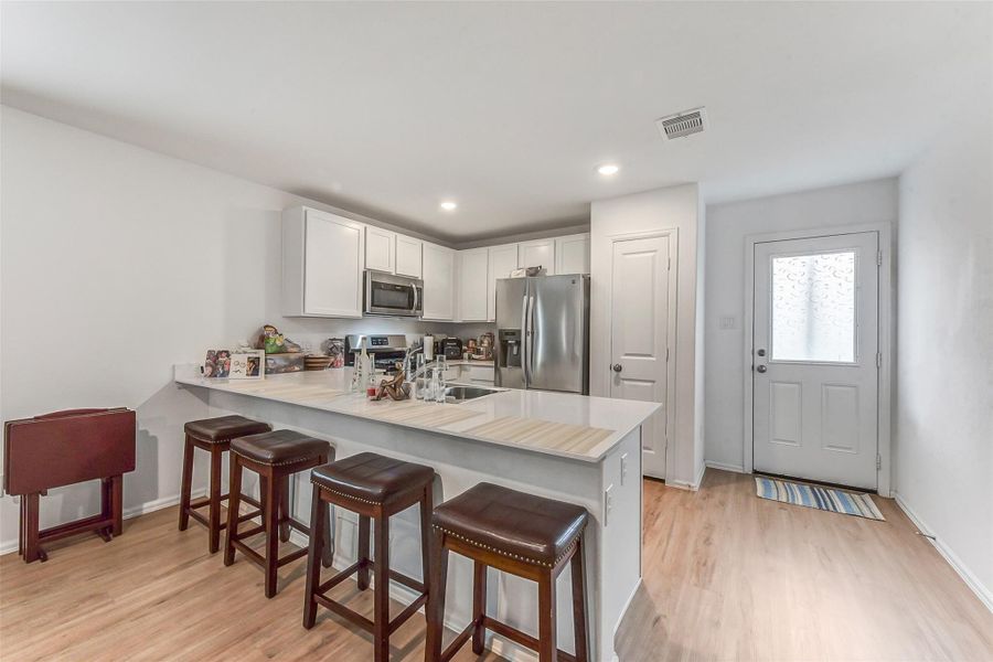 Furnished interior view inside a new home in Burnet Fields at Baytown Crossings, Baytown (Image 10).