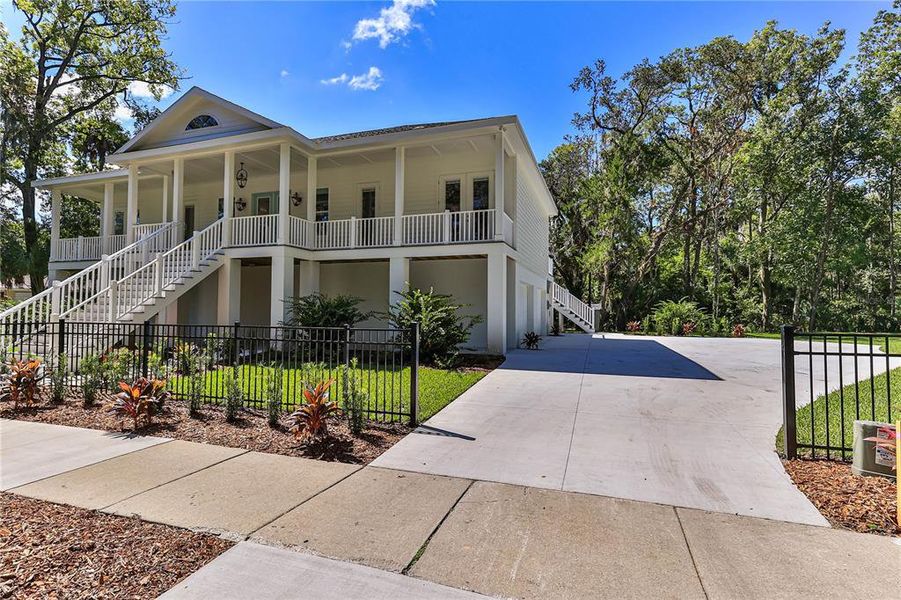 Front exterior of a new home in , Crystal River, FL, highlighting curb appeal (Image 27). Front exterior of a new home in , Crystal River, FL, highlighting curb appeal (Image 27).