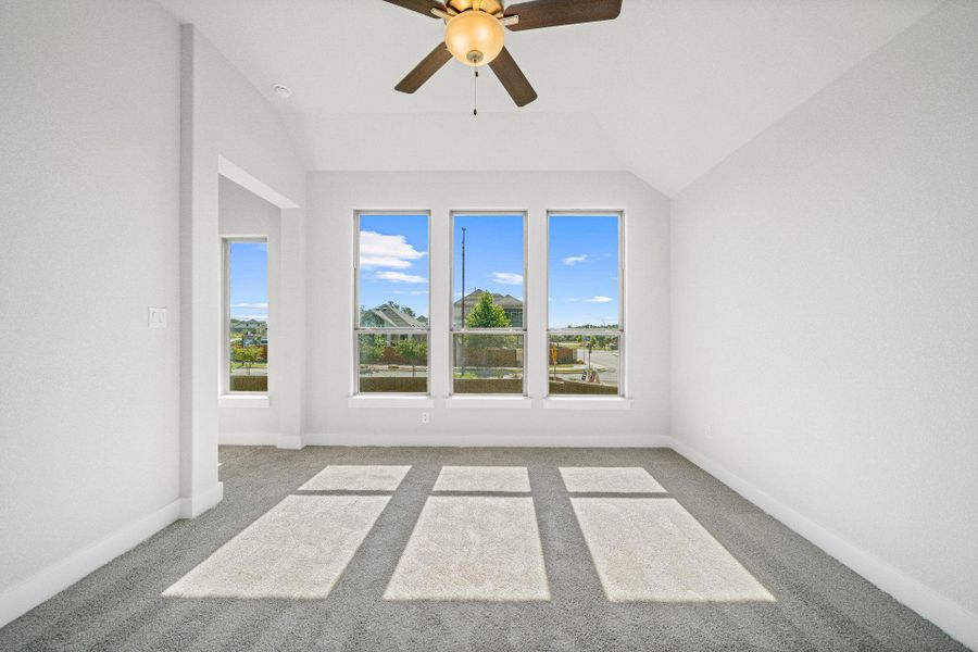 Primary Bedroom with elevated ceiling Primary Bedroom with elevated ceiling