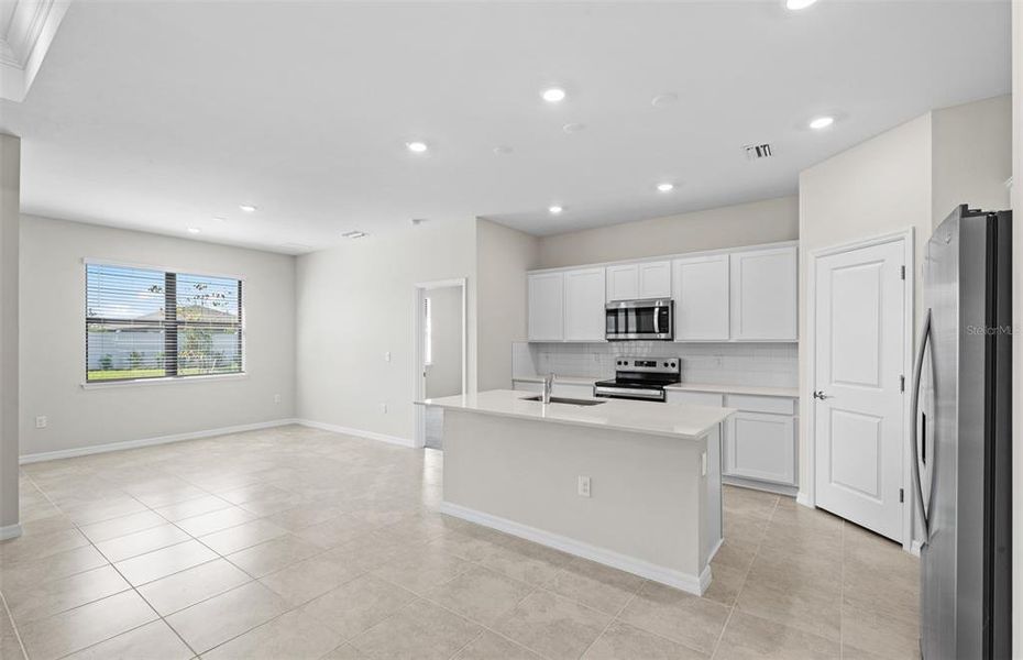 Furnished interior view inside a new home in The Strand at Cedar Grove, North Port (Image 3).