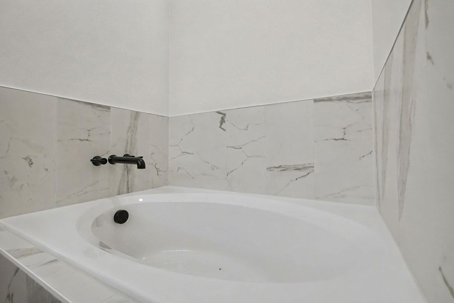 Bathroom featuring a garden tub