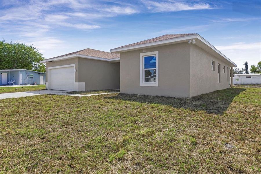 Exterior details and patio area of a home in , Port Charlotte (Image 22).