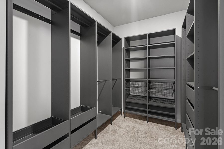 Custom shelving in the large primary closet! Custom shelving in the large primary closet!
