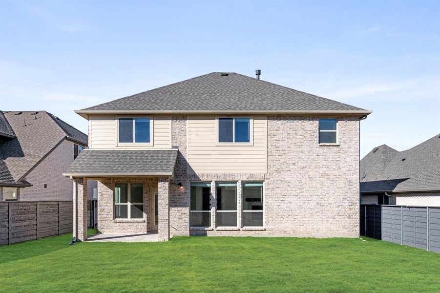 Exterior details and patio area of a home in Union Park Classic 55, Little Elm (Image 28).