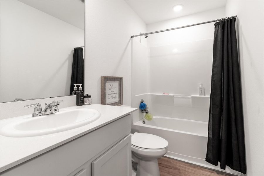 Furnished interior view inside a new home in Burnet Fields at Baytown Crossings, Baytown (Image 12). Furnished interior view inside a new home in Burnet Fields at Baytown Crossings, Baytown (Image 12).