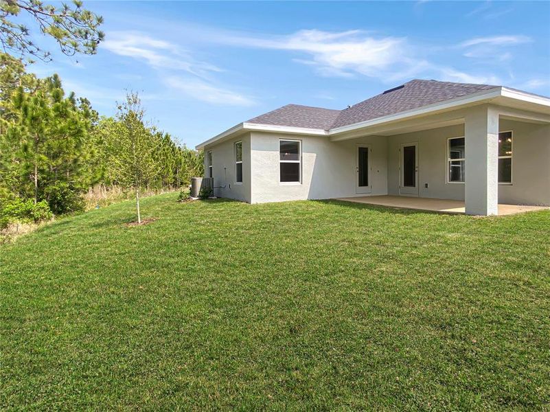 Exterior details and patio area of a home in , St. Cloud (Image 17).