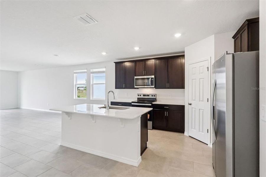 Furnished interior view inside a new home in The Meadow at Crossprairie, St. Cloud (Image 11). Furnished interior view inside a new home in The Meadow at Crossprairie, St. Cloud (Image 11).