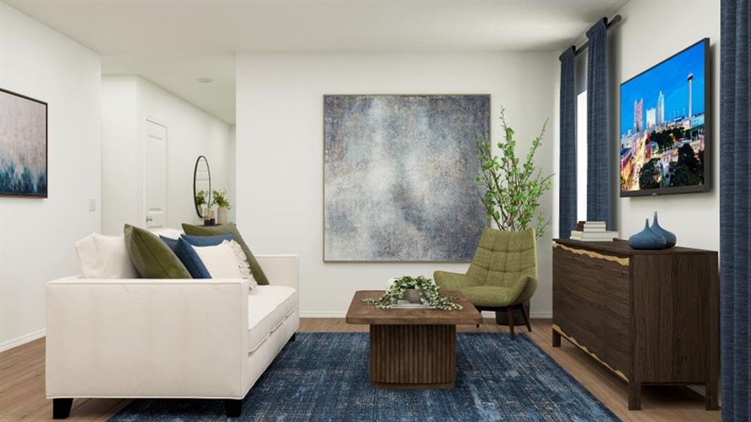 Sitting room with dark wood-style floors and baseboards